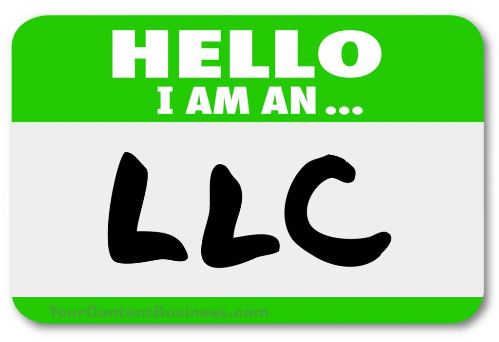Green and white nametag that reads "Hello, I am an" and written in black marker is LLC.